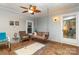 Relaxing covered porch with a ceiling fan and a comfortable porch swing at 6804 Lineberger Rd, Denver, NC 28037