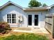 Cozy backyard space with a small patio area and white siding, perfect for relaxation and outdoor enjoyment at 711 4Th Sw Ave # B3, Conover, NC 28613
