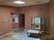 View of empty living room showcasing neutral walls and ceiling with a simple coffee table at 711 4Th Sw Ave # B3, Conover, NC 28613