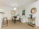 Bright and inviting dining area featuring a charming window seat, perfect for entertaining or casual dining at 716 Ellsworth Rd, Charlotte, NC 28211