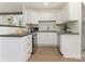 Efficient kitchen featuring sleek countertops, stainless steel appliances, and ample storage space at 716 Ellsworth Rd, Charlotte, NC 28211