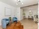 Stylish living room showcasing modern decor, comfortable seating, and seamless access to the dining area at 716 Ellsworth Rd, Charlotte, NC 28211