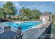 Inviting community pool with ample seating and a clean, bright atmosphere at 7722 Springs Village Ln # 40, Charlotte, NC 28226