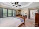 Spacious main bedroom with neutral walls and large windows at 7730 Windsor Forest Pl, Harrisburg, NC 28075