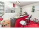 Cozy bar area with seating and mirrored wall, perfect for entertaining guests in a retro style at 812 Clinton Ave, Lancaster, SC 29720