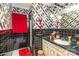 Unique bathroom with black-and-white checkered wallpaper and shower with a vibrant red curtain at 812 Clinton Ave, Lancaster, SC 29720