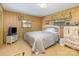 Inviting bedroom featuring a comfortable bed, bright windows, and classic furnishings at 812 Clinton Ave, Lancaster, SC 29720