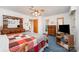 Comfortable bedroom boasts blue carpeting, traditional furnishings, and multiple closets at 812 Clinton Ave, Lancaster, SC 29720