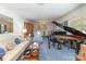 Bright living room with a grand piano and classic decor at 812 Clinton Ave, Lancaster, SC 29720