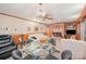 Spacious living room with a brick fireplace, built-in bookshelves, and a dining area, ideal for gatherings at 812 Clinton Ave, Lancaster, SC 29720
