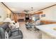 Cozy living room featuring a brick fireplace and sliding glass doors at 812 Clinton Ave, Lancaster, SC 29720