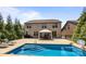 Backyard with a refreshing pool, patio with a gazebo, and lush landscaping at 8614 Goodman Park Ct, Charlotte, NC 28277