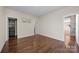 Bedroom with hardwood floors and walk-in closet at 8614 Goodman Park Ct, Charlotte, NC 28277