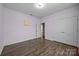 Bedroom with hardwood floors and ample closet space at 8614 Goodman Park Ct, Charlotte, NC 28277