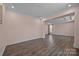 Light-filled bonus room with hardwood floors, recessed lighting, and neutral paint, offering versatility and comfort at 8614 Goodman Park Ct, Charlotte, NC 28277