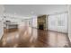 Open floor plan, stone fireplace, and modern kitchen features at 8614 Goodman Park Ct, Charlotte, NC 28277