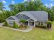 Charming single-story home with well-manicured lawn and attractive landscaping, creating excellent curb appeal at 907 Lingfield Ln, Waxhaw, NC 28173