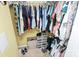 Walk-in closet offers ample storage, with organized shelving and rods for clothing and shoes at 9212 Scotts Elm Ct, Charlotte, NC 28215
