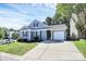 Charming single-story home with a well-manicured lawn and attached one car garage at 9212 Scotts Elm Ct, Charlotte, NC 28215