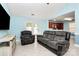 Bright living room with tile floors and lots of natural light at 9212 Scotts Elm Ct, Charlotte, NC 28215