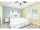 Cozy main bedroom with a tray ceiling and neutral colors at 9212 Scotts Elm Ct, Charlotte, NC 28215