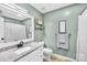 Stylish bathroom featuring granite countertops, framed mirror, and modern fixtures at 1013 E Academy St, Cherryville, NC 28021