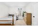 Bedroom with a full size bed, dresser, and plenty of natural light at 1013 E Academy St, Cherryville, NC 28021