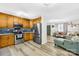 Bright, updated kitchen with adjacent living area, stainless steel appliances, and lovely floors at 1013 E Academy St, Cherryville, NC 28021