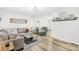 Bright living room with modern flooring, neutral decor, and comfortable seating at 1013 E Academy St, Cherryville, NC 28021