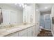 Bright bathroom featuring double vanity, granite countertops, and a glass enclosed shower at 1013 Old Charlotte Rd, Statesville, NC 28677