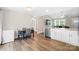 Open-concept kitchen and dining area with stainless steel appliances and ample counter space at 1013 Old Charlotte Rd, Statesville, NC 28677