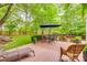 Spacious wooden deck with comfortable seating, ideal for outdoor entertaining and relaxation at 1023 Evian Ln, Matthews, NC 28105