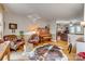 Cozy living room with hardwood floors, comfortable seating, fireplace, and stylish decor at 1023 Evian Ln, Matthews, NC 28105