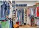 A spacious walk-in closet with ample storage space, including shelving, rods, and floor space at 1023 Evian Ln, Matthews, NC 28105