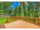 Well-maintained wooden deck providing an ideal spot for relaxation and enjoying the backyard view at 106 Kirsche Ct, Mooresville, NC 28115