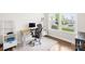 Well-lit home office with a modern desk, shelving, and a large window at 106 Kirsche Ct, Mooresville, NC 28115