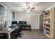 Bedroom with carpet, ceiling fan, and closet, creating a comfortable and functional living space at 108 Augusta Dr, Statesville, NC 28625