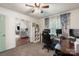 Inviting home office featuring a ceiling fan, neutral paint, and an open doorway to the rest of the home at 108 Augusta Dr, Statesville, NC 28625