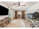 Spacious living room with wooden barn doors, a ceiling fan, and lots of room for entertaining and relaxing at 108 Augusta Dr, Statesville, NC 28625