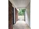 Open back porch offers view of fenced backyard; concrete floor at 11 N 10Th Ave, Maiden, NC 28650