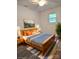 Cozy bedroom with warm lighting and a serene ambiance, bright window and wood trim at 11 N 10Th Ave, Maiden, NC 28650