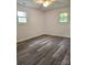 This bedroom features modern flooring, neutral walls, and plenty of natural light at 11 N 10Th Ave, Maiden, NC 28650