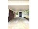 Covered carport features concrete flooring and storage area at 11 N 10Th Ave, Maiden, NC 28650