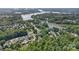 Overhead shot of neighborhood showcasing homes along a waterfront property at 111 Wilton Pl, Mooresville, NC 28117