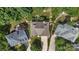 Aerial view of neighborhood home showcasing its roofline, driveway and lush surroundings at 111 Wilton Pl, Mooresville, NC 28117