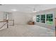Large upstairs bonus room with natural light and lots of space for recreational activities or relaxation at 111 Wilton Pl, Mooresville, NC 28117