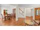 Spacious living area flowing into a formal dining room with hardwood floors at 111 Wilton Pl, Mooresville, NC 28117