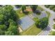 Aerial shot of tennis courts with playground and parking in a park like setting at 111 Wilton Pl, Mooresville, NC 28117