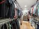 Walk-in closet offering abundant storage and organization, featuring shelves and racks at 1207 Carlson Dr, Monroe, NC 28110