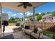 Relaxing covered patio featuring comfortable seating, perfect for enjoying the outdoors at 12802 Waterlyn Club Dr, Charlotte, NC 28278